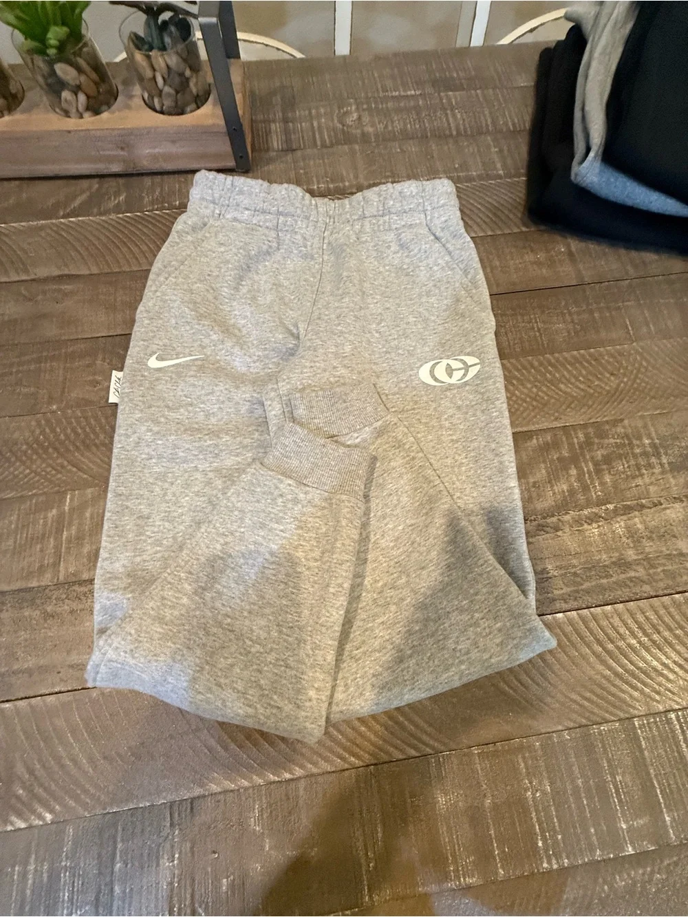 Nike Gray Girl’s Caitlin Clark Fleece Joggers with White Logos
